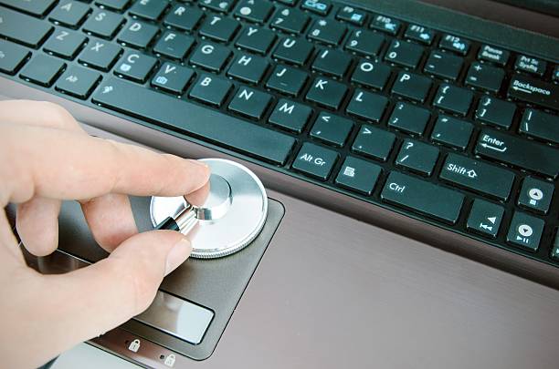 istock Diagnosis and repair of computers. Stethoscope on laptop 511324861