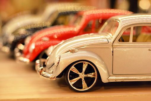 Ankara, Turkey - September 19, 2015: Vintage Volkswagen toy cars in different colors. The Volkswagen Type 1, widely known as the Volkswagen Beetle, was an economy car produced by the German auto maker Volkswagen (VW) from 1938 until 2003.