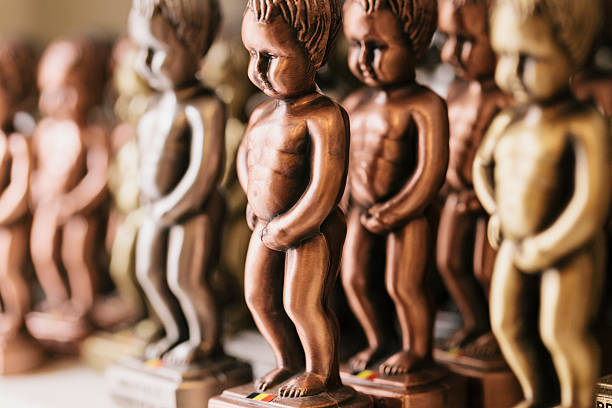 Manneken Pis statues at a gift shop in Brussels, Belgium