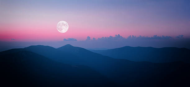 Photo of Fool moon rising over the mountain range