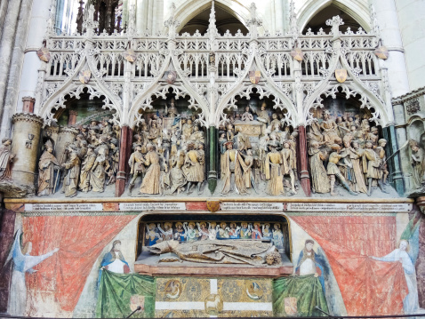 Amiens, France - August 10, 2014: decorated tomb in Amiens Cathedral, France. The Cathedral Basilica of Our Lady of Amiens was built between 1220-1270 and has been listed as UNESCO World Heritage Site
