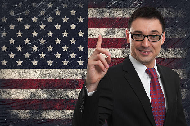 istock Grunge USA Flag and handsome businessman 511327183