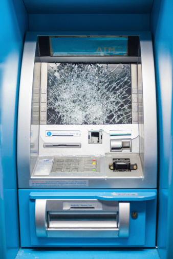 ATM Smashed by mob members. it's dangerous to use because shattered glass