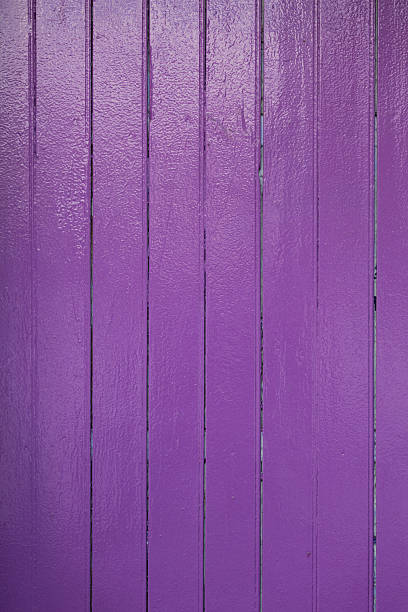 A wooden board painted in purple. Perfect to use as a background.