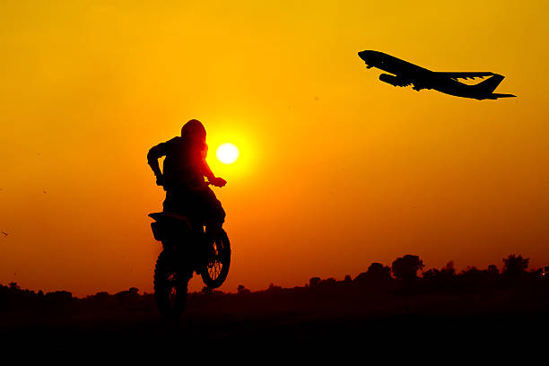 istock Silhouette Motocross and Airplane 511351877