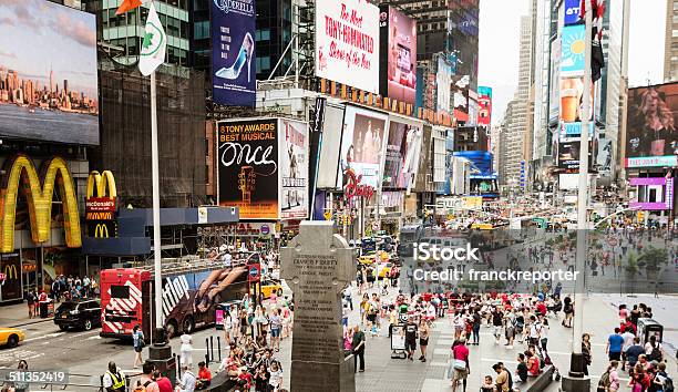 Tourist In Times Square New York City Stock Photo - Download Image Now - Crowd of People, Times Square - Manhattan, American Culture