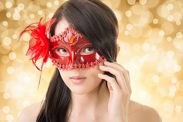 istock woman in a carnival mask 511353051