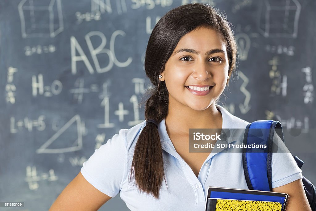 Portrait of pretty Indian high school student in classroom Student Stock Photo