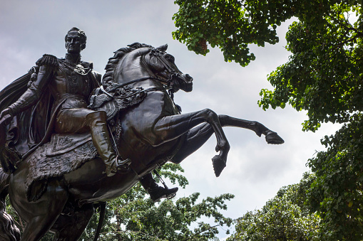 Old Bronze statue of Simon Bolivar at the center of Caracas, Venezuela