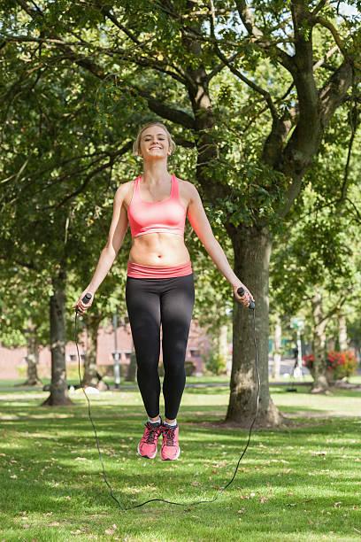 istock Blonde sporty woman skipping 511356507