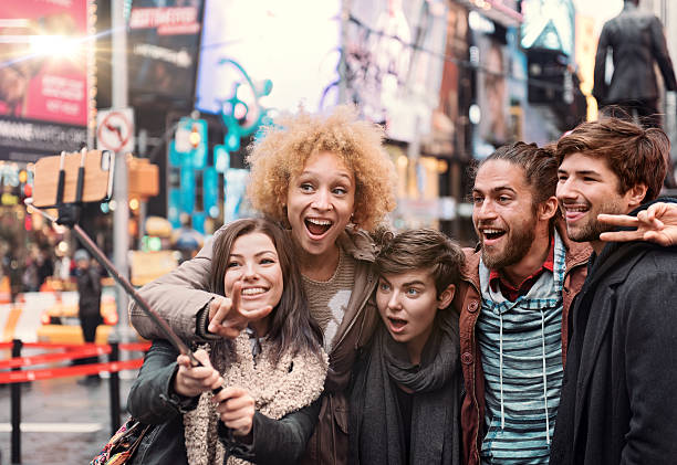 istock Group of friends making selfie 511360904