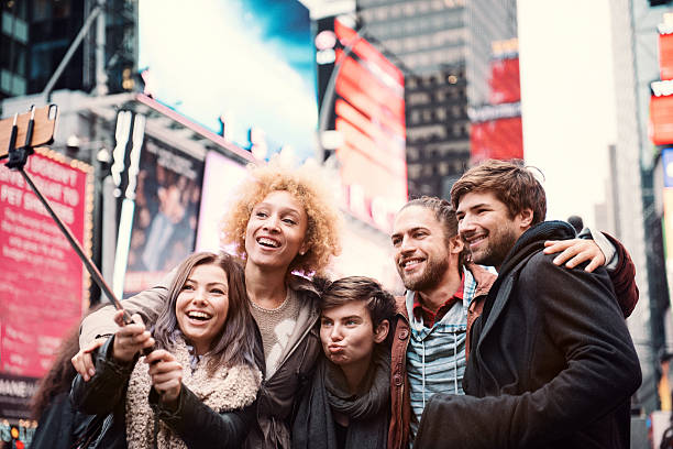 istock Group of friends making selfie 511360976