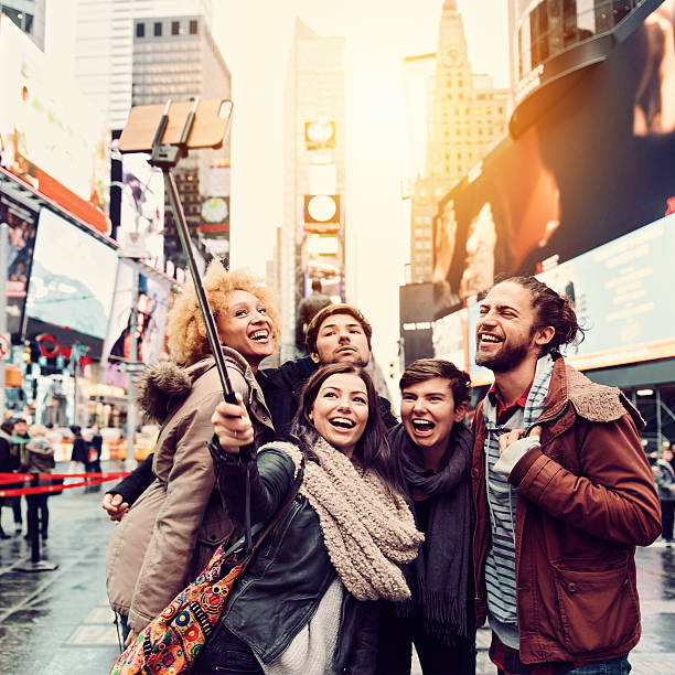 istock Group of friends making selfie 511361262