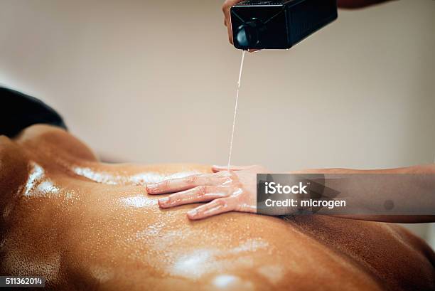 Sports Massage Stock Photo - Download Image Now - Massaging, Essential Oil, Crude Oil