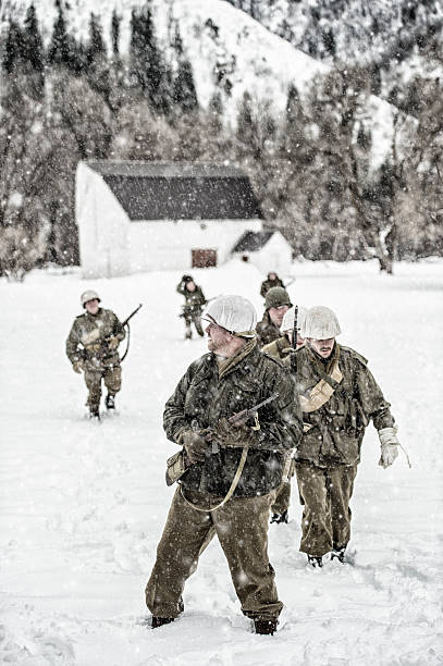 istock WWII US Military Squadron On Patrol In A Winter Blizzard 511364384