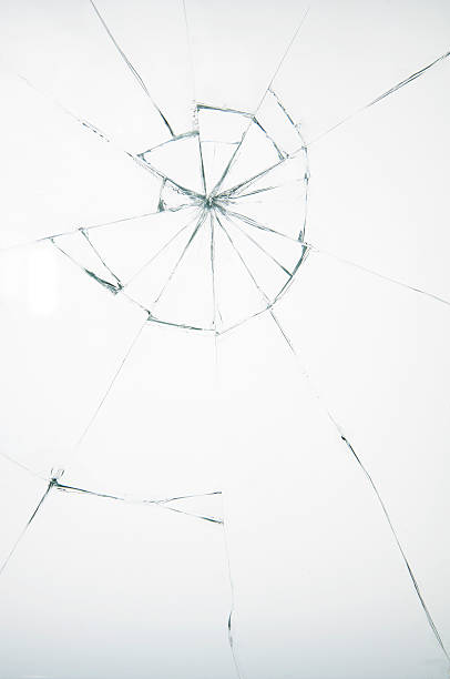 сломанный стекло на белом фоне - breaking wind стоковые фото и изображения