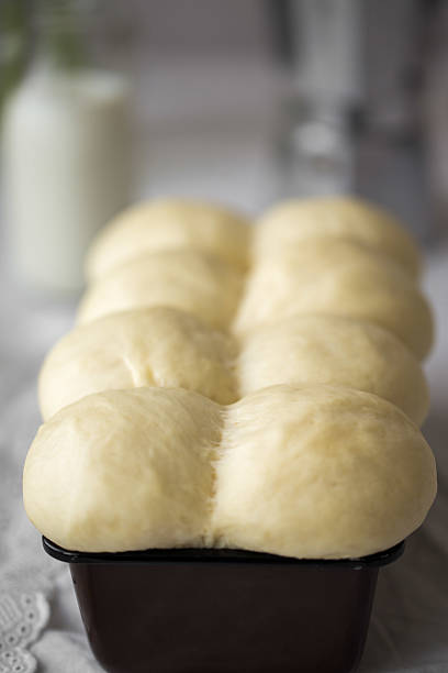 istock Brioche dough on a tray. Baked concept 511371516