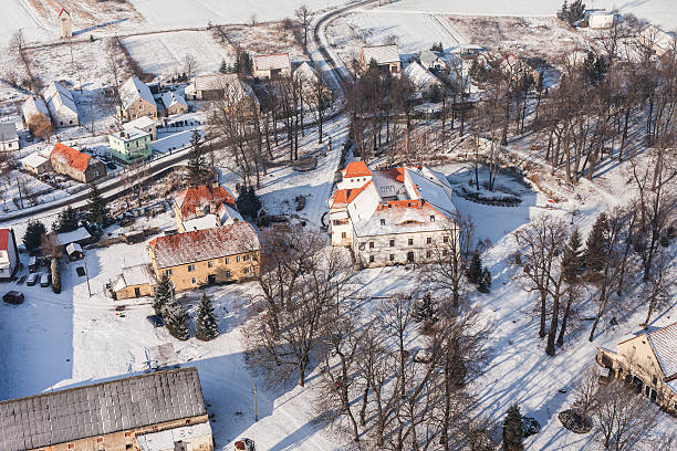 istock aerial view  over the harvest fields in winter 511371594