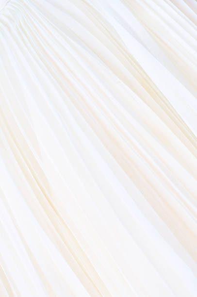 istock Background of white pleated fabric located diagonal 511371706