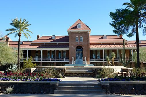 The Old Main building in the campus of University of Arizona in downtown Tucson, Arizona, USA. University of Arizona is a public education institution founded in 1885 with a student enrollment of more than 42,000.