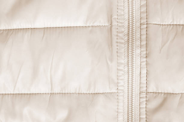 istock beige background with fragment jacket and zipper 511373990