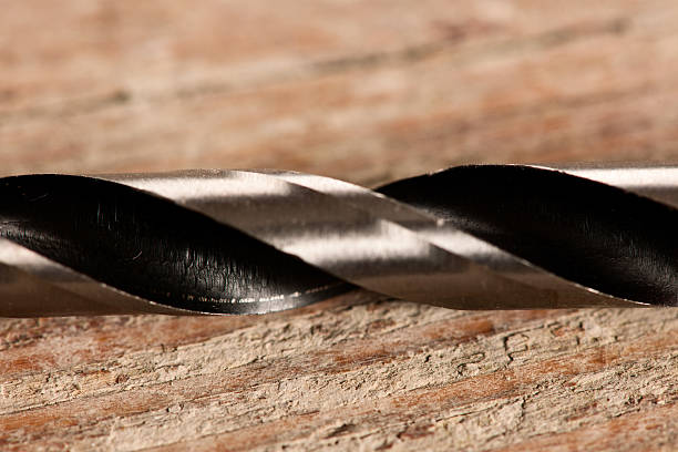 istock Macro image of Drill bits for wood on wooden desk. 511375828