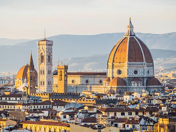 istock Florence's cathedral and skyline at sunset 511376924