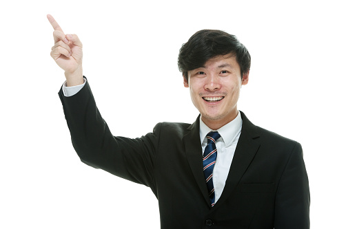 Young Japanese businessman on white background