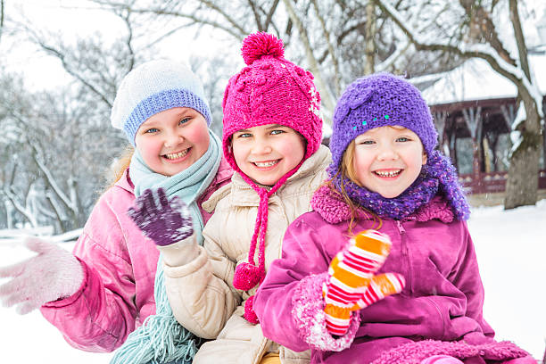 istock Cute family having fun in the snow 511377652