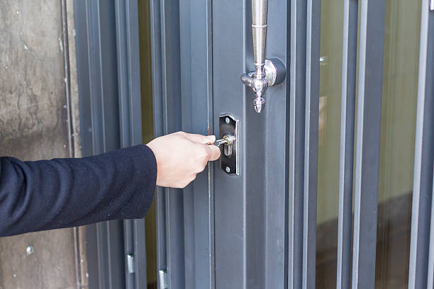 istock Hand opening a door a door 511378278