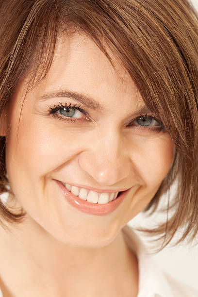 istock Adult smiling brunette in close-up 511378694