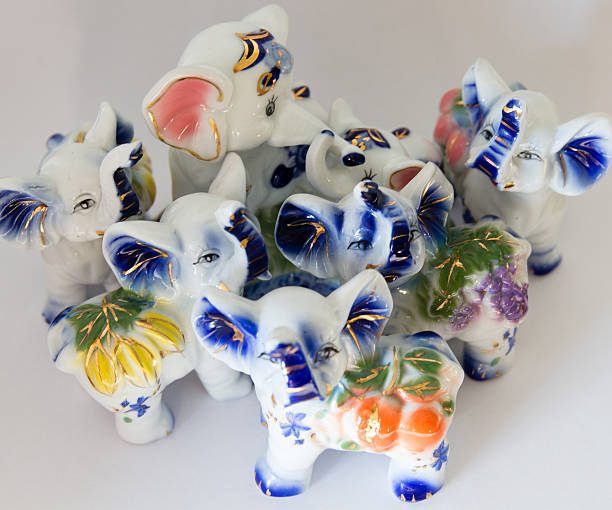 istock Symbol of seven elephants figurines on a white background, Feng 511378732