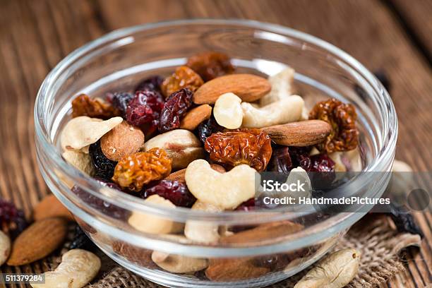Trail Mix On Wooden Background Stock Photo - Download Image Now - Almond, Berry, Berry Fruit
