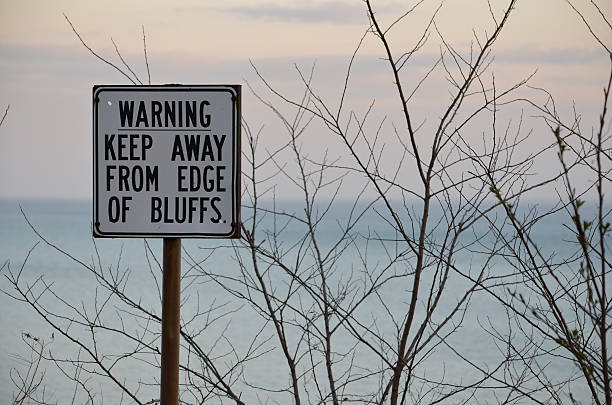 istock Edge of Bluffs Warning Sign 511379824
