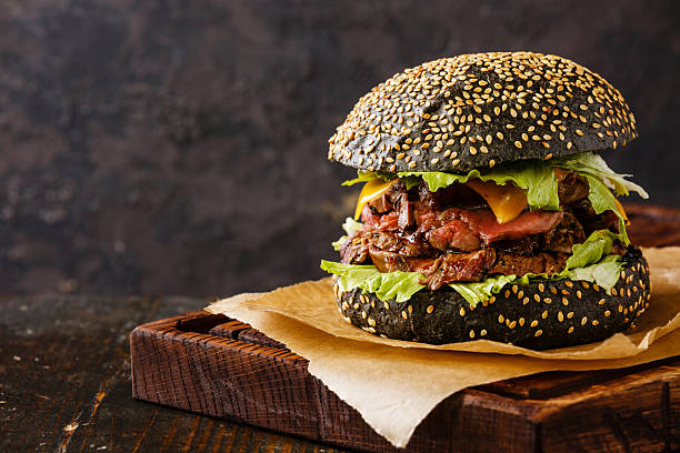 istock Roast beef Burger on sesame bun with sliced Pastrami 511380000