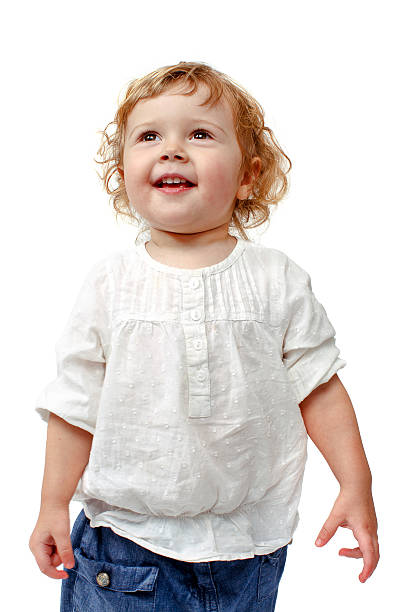 istock Young baby standing indoors applauding and smiling 511380100