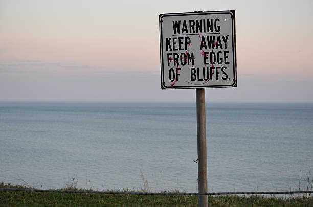 istock Edge of Bluffs Warning Sign 511380194