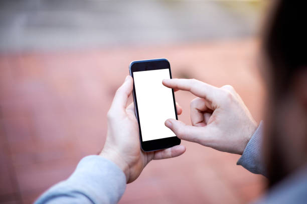 istock Businessman Holding a Smart Phone 511384588