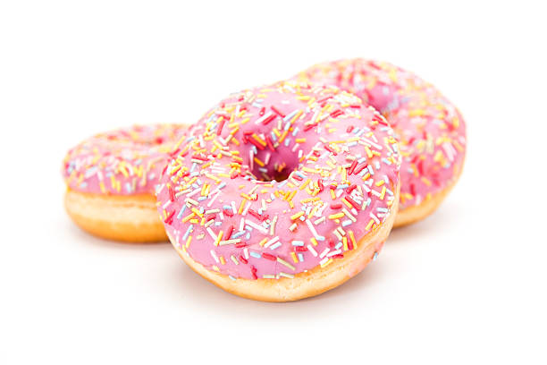 istock strawberry flavoured pink donut 511385960