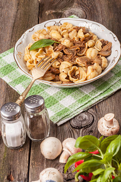 istock Pork stew with mushrooms, basil and red pepper. 511387077