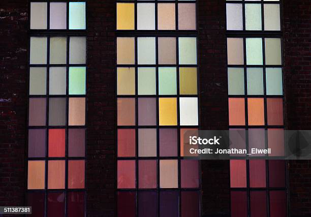 Multicolored Window Panes In Brick Wall Stock Photo - Download Image Now - Brick, Brick Wall, Colors