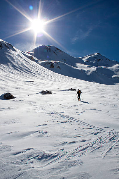 istock skier making turns in the slope of a mountain 511387884