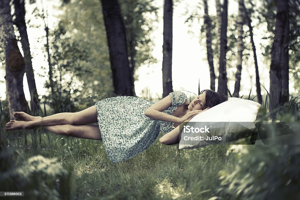 Dreams Young woman sleeping, toned image Sleeping Stock Photo