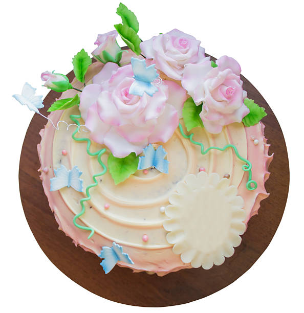 istock beautiful cake with sugar roses, isolated on a white background 511388686
