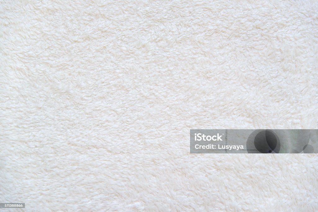 White background of plush fabric Beige background of plush fabric Textured Stock Photo