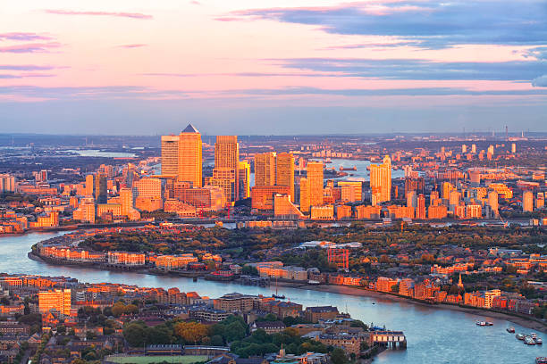 istock London Docklands Canary Wharf cityscape panorama at sunset 511391108