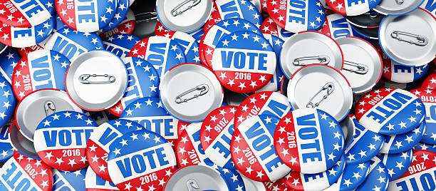 istock vote election badge button for 2016 background 3d Illustrations 511391458