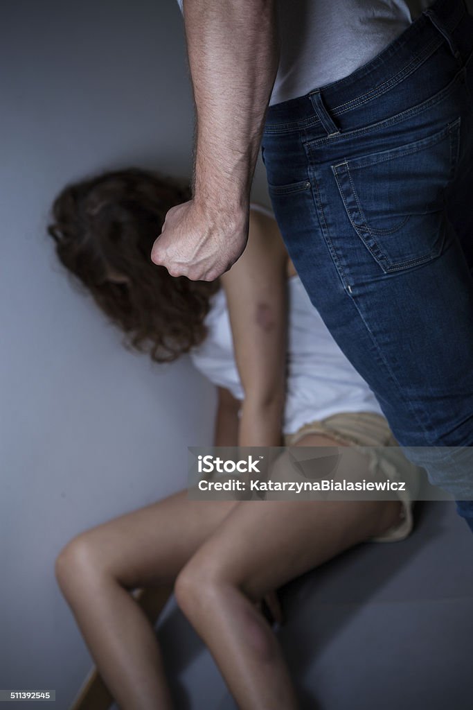 Woman is a victim of violence Woman is a victim of the violence Adult Stock Photo