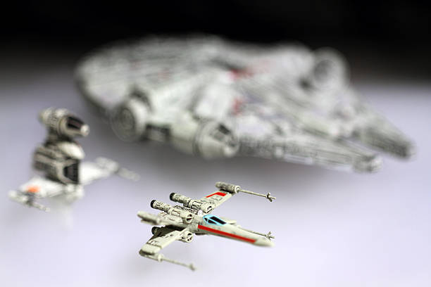 Vancouver, Canada - January 25, 2016: The Millenium Falcon and and other rebel starfighters from the Star Wars movie franchise. The models were made for the X-Wing minature game for Fantasy Flight Games