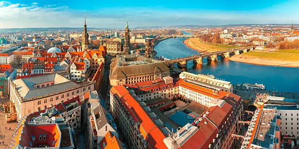 Aerial scenic panorama of the Old Town of Dresden: river Elbe with Augustus Bridge, Hofkirche and Royal Palace, Saxony, Germany